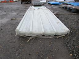 (30) 142.5'' X 35'' POLYCARBONATE PLASTIC CLEAR WAVED ROOFING PANELS (UNUSED) *TOP PANEL DAMAGED