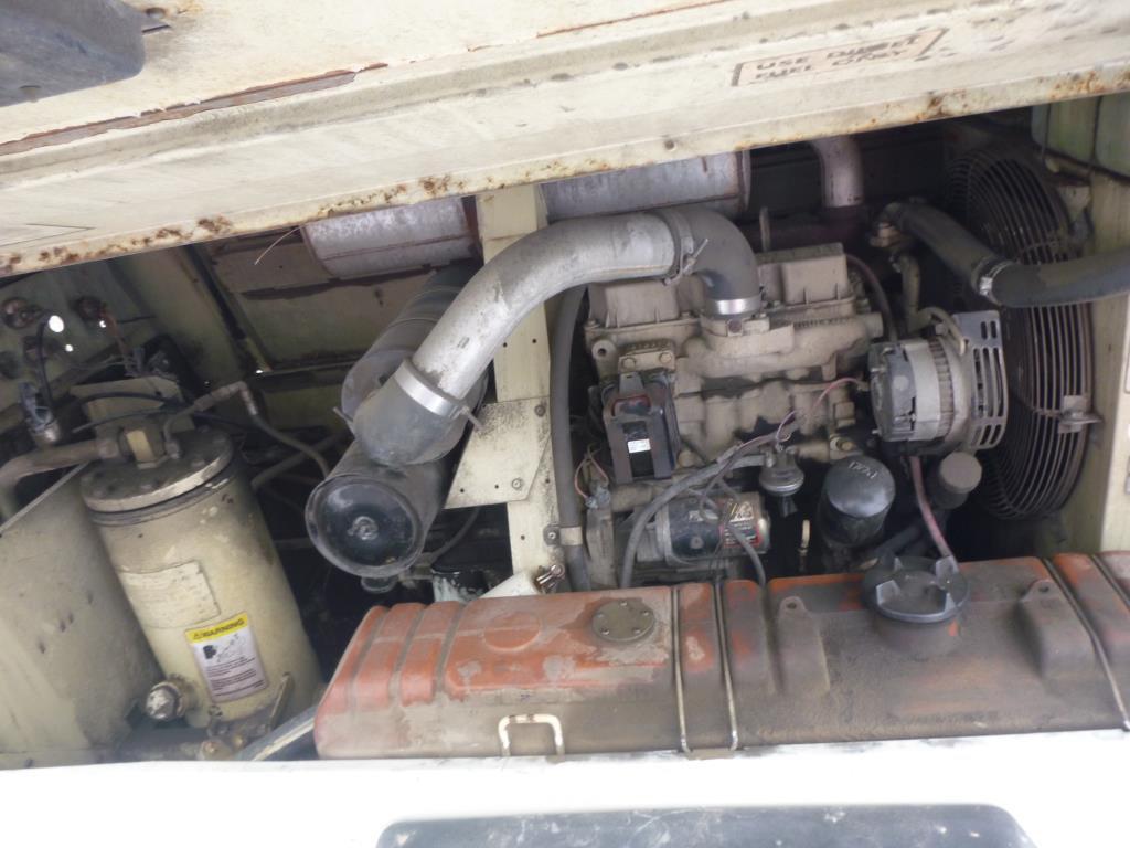 '94 INGERSOLL RAND S/A AIR COMPRESSOR W/ HITCH 3 CYL DIESEL. 10,850 HRS. MO