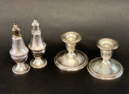 Sterling Silver Salt & Peppers Shakers with a Pair of Candlesticks