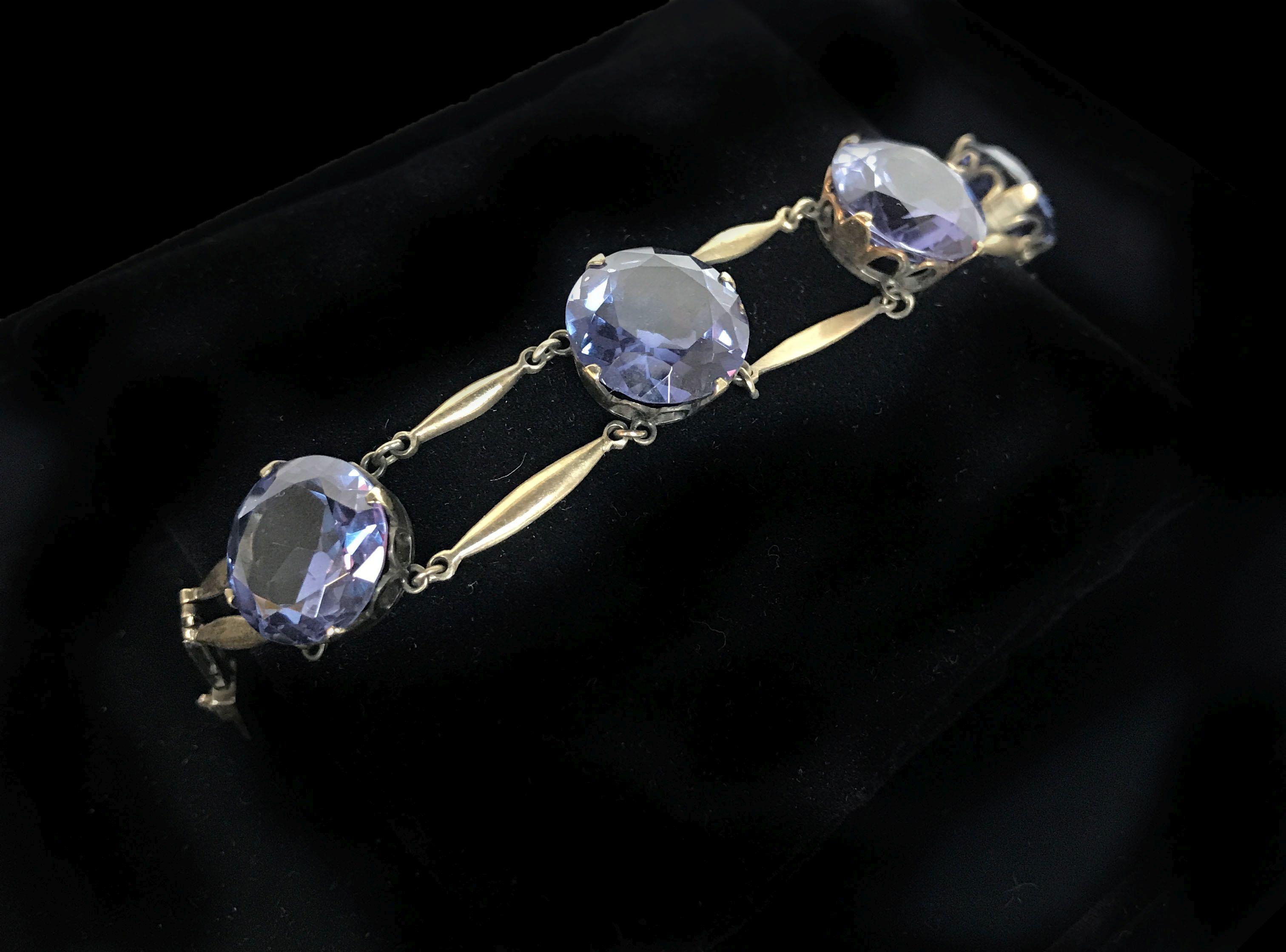 14KT Yellow Gold Earrings and Rose Gold Colored Bracelet with Blue/Purple Tanzanite Colored Stones