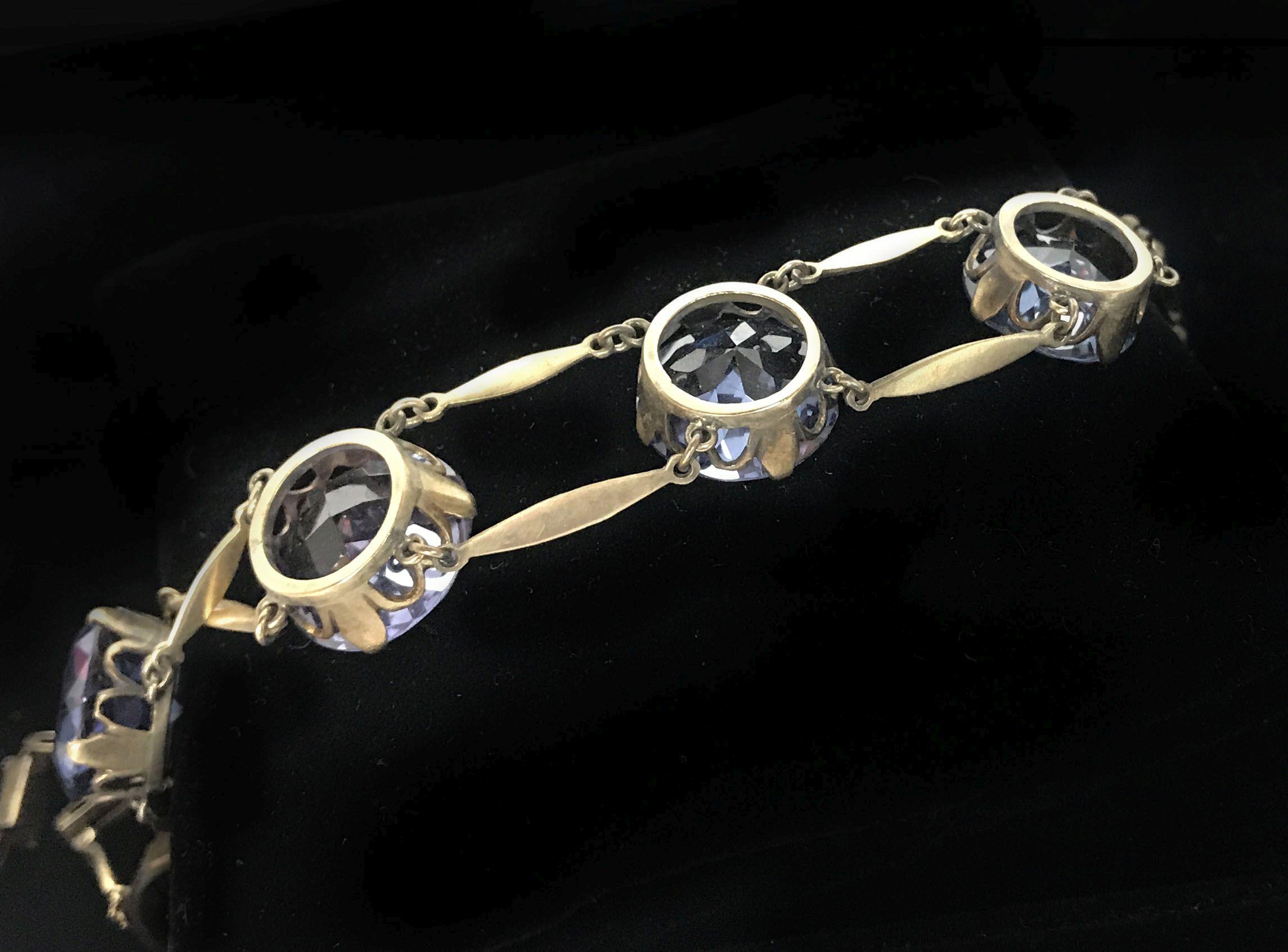 14KT Yellow Gold Earrings and Rose Gold Colored Bracelet with Blue/Purple Tanzanite Colored Stones