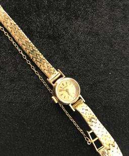 Pair of 14KT Yellow Gold Omega and Lady Elgin Antique Watches