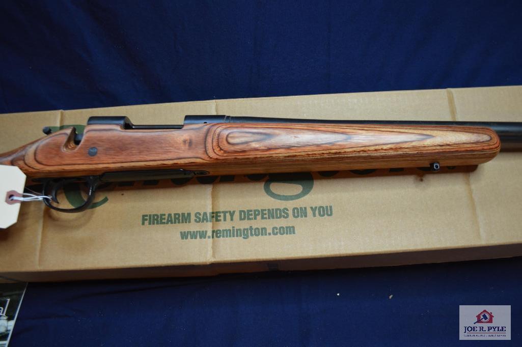 Remington 700 204 RUGER. Serial G6375828. Laminate Stock Medium Heavy Barrell W/Box .