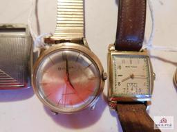 4 Watches and Buckle (1) Elkin sportsman 17 Jewel (1) Bulova 10k Rolled Gold Plate Case (1) Waltham