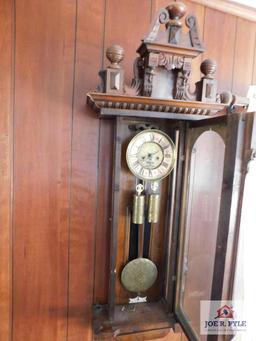 Ornate clock w/ engraved pendulum and weights w/ key