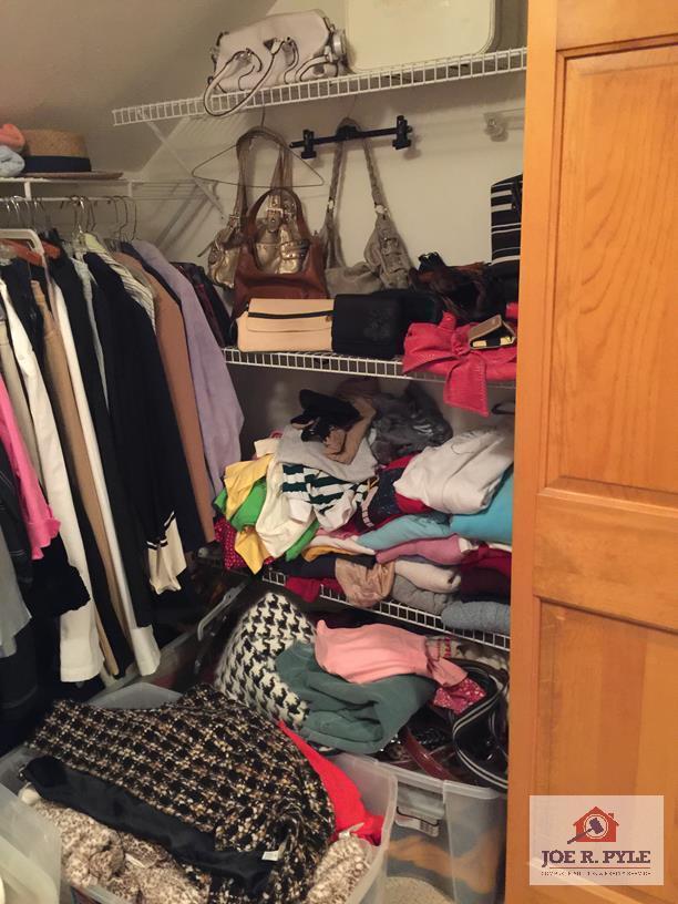 Contents of closet: ladies clothing and accessories