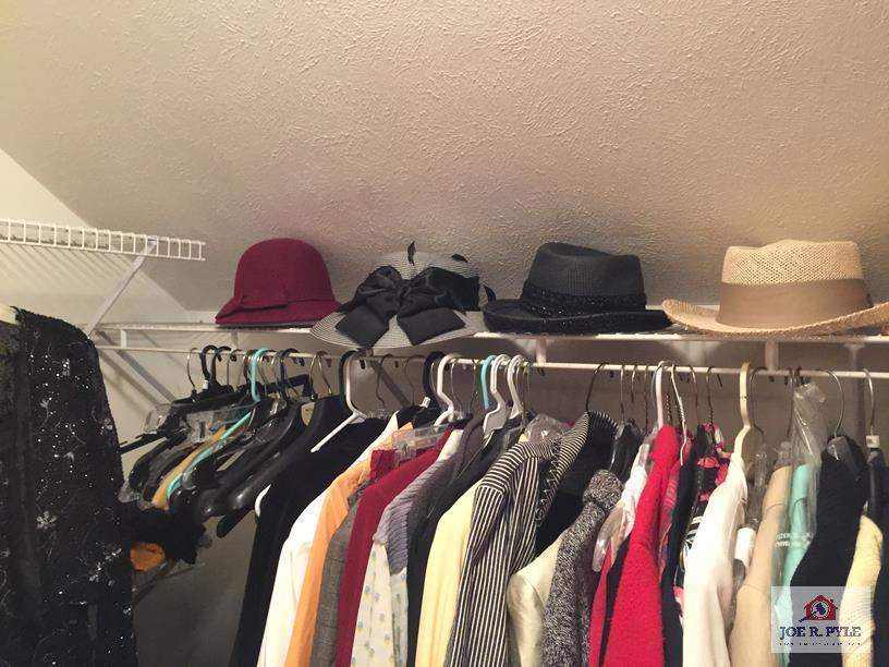 Contents of closet: ladies clothing and accessories