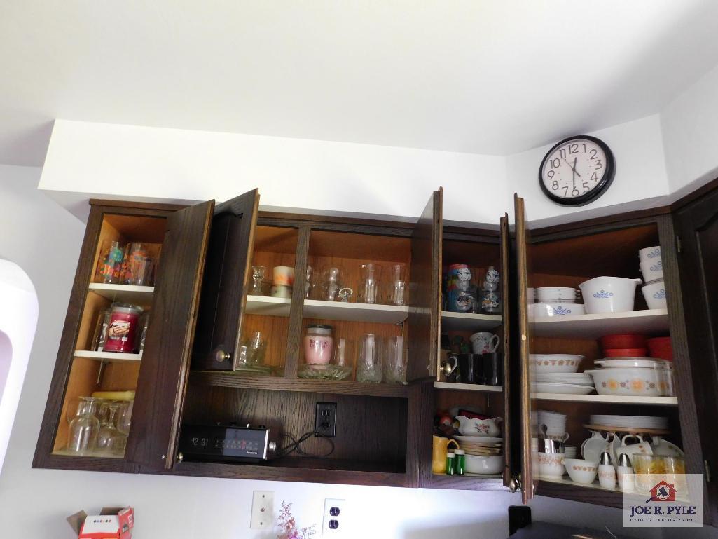 Contents of cabinets - corning ware, baking dishes, Corelle dishes, glasses, mugs, candlesticks,