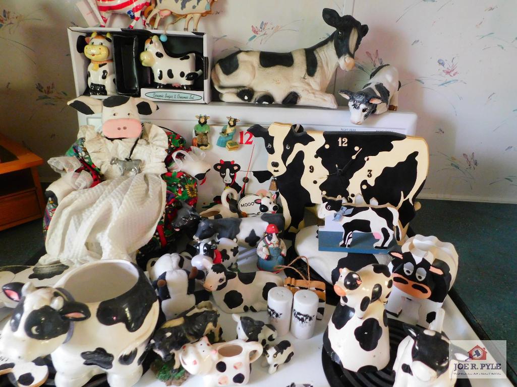 Large collection of cow decorative items