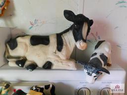 Large collection of cow decorative items