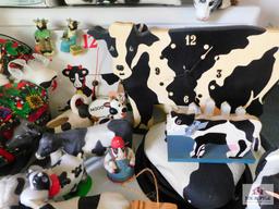 Large collection of cow decorative items