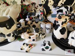 Large collection of cow decorative items