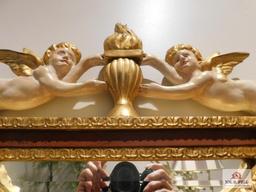 Gold finish mirror with cherubs
