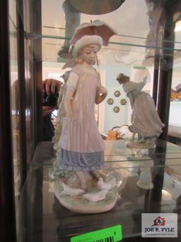 lladro lady feeding doves