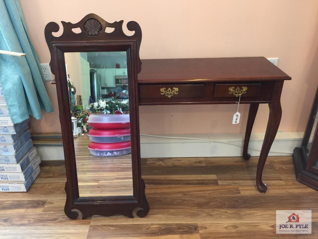 Queen Anne style library table and shell motif wall mirror