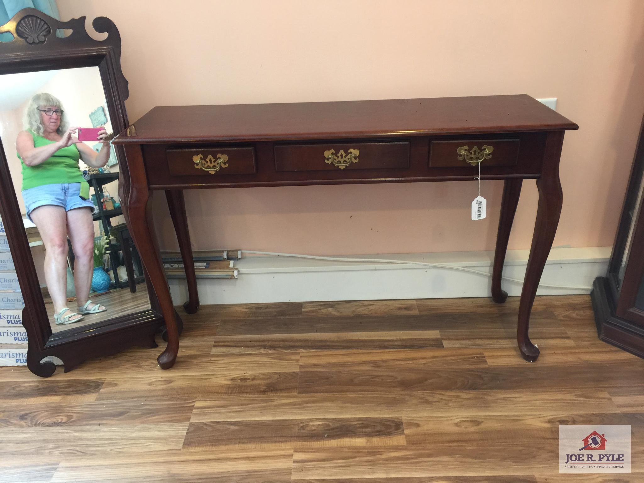 Queen Anne style library table and shell motif wall mirror