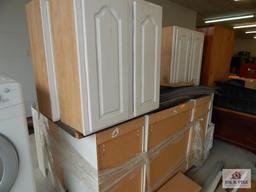 White kitchen cabinet & countertop with sink