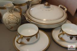 Collection of gold trimmed china pieces and 2 Donatello cups and saucers