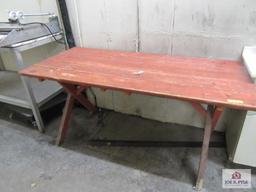 wooden table 27 inches wide, 60 inches long, 28 inches tall
