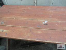 wooden table 27 inches wide, 60 inches long, 28 inches tall