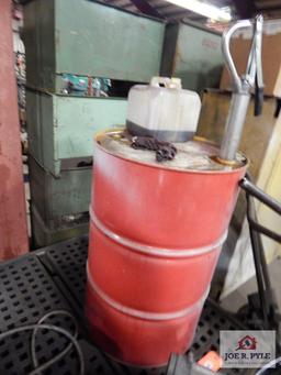 3 Partial drums of hydraulic fluid