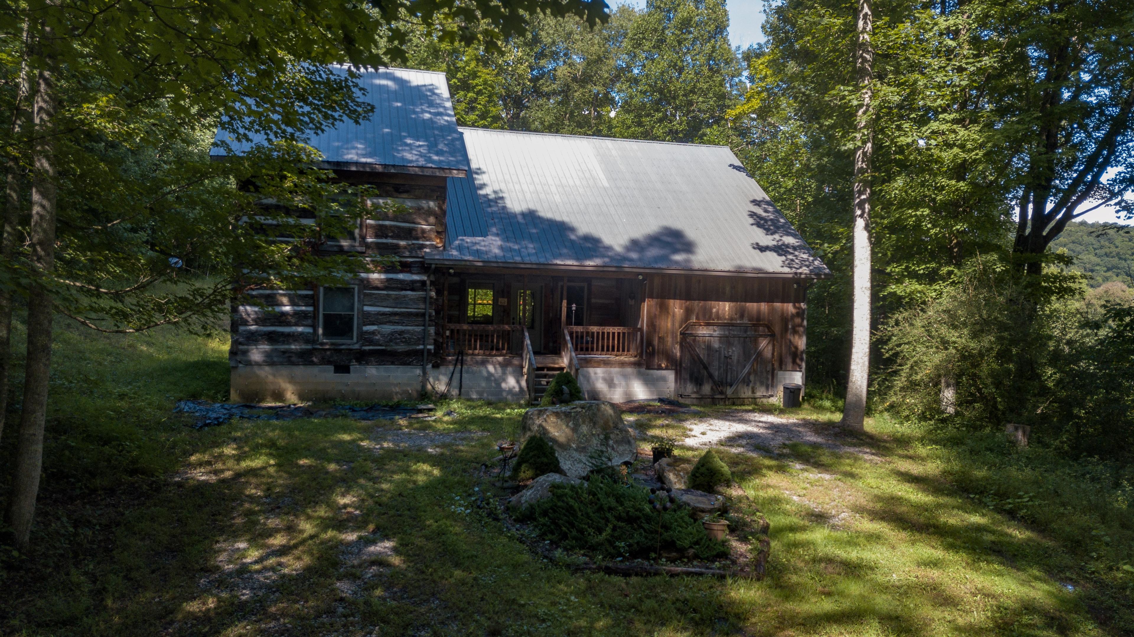 Unique Log Home on 5 Acres