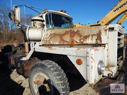 1971 Mack DM800 off road truck triple frame w/ no bed; it has hydraulic jack