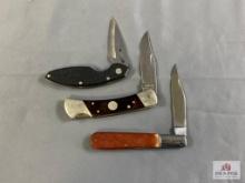 [393] Three large folding knives: Camillus, Buck