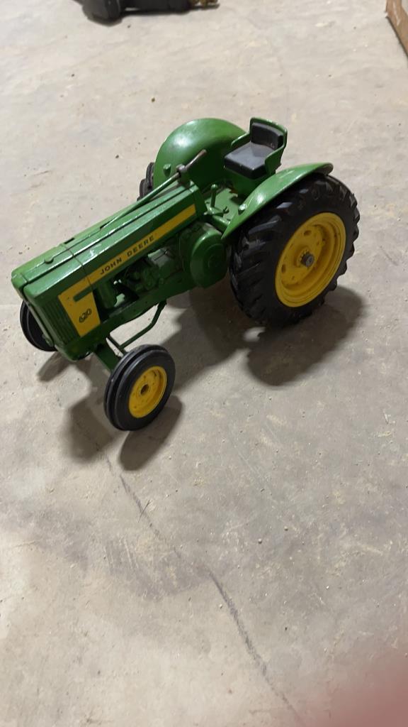 BOX OF JOHN DEERE TRACTORS & MISC TOYS