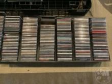 3 CD RACKS FULL OF CDS