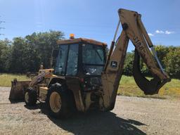 1995 John Deere 310D 4x4 Loader Backhoe (CSX Unit# TBH9523)