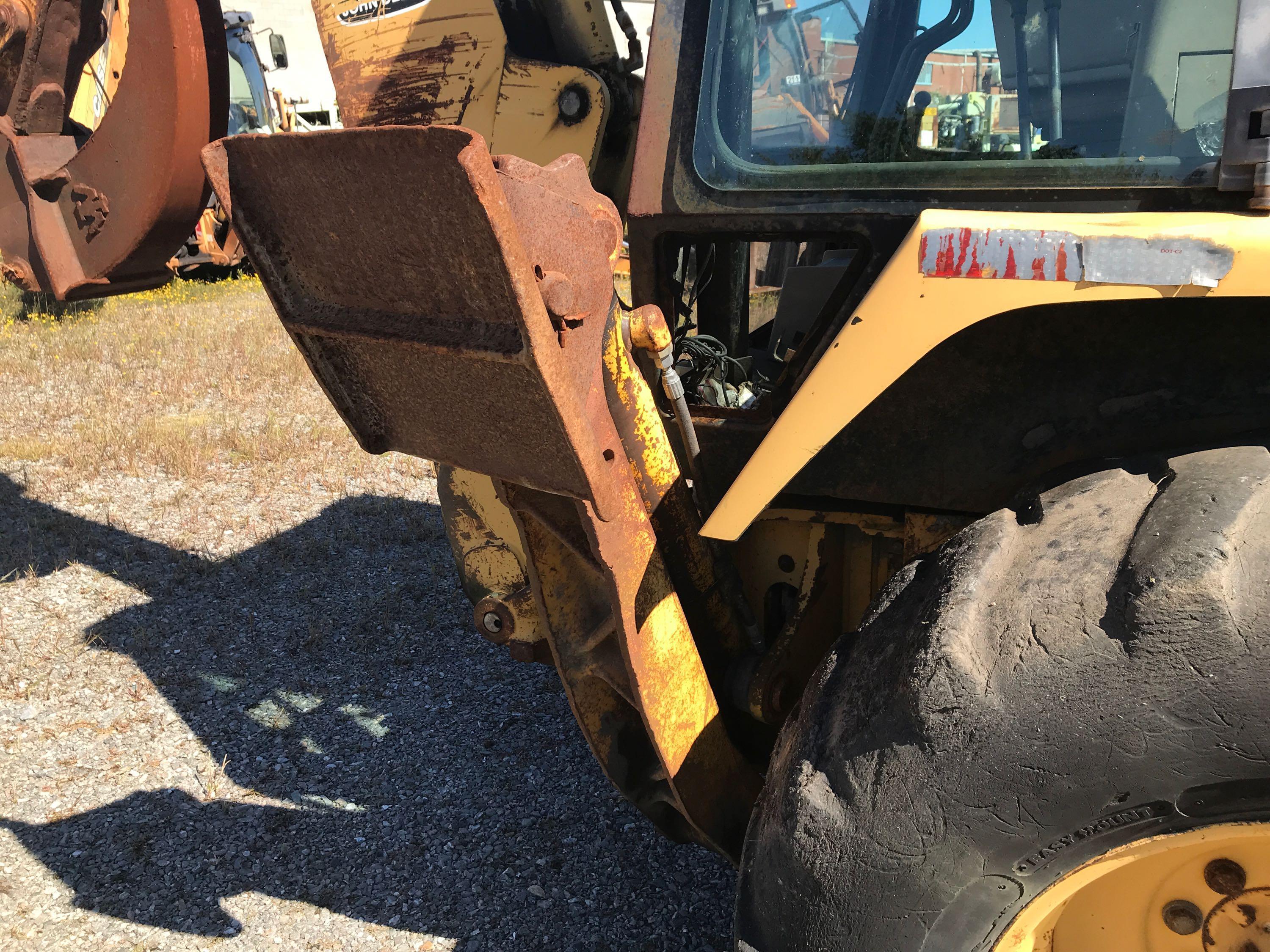 1995 John Deere 310D 4x4 Loader Backhoe (CSX Unit# TBH9523)