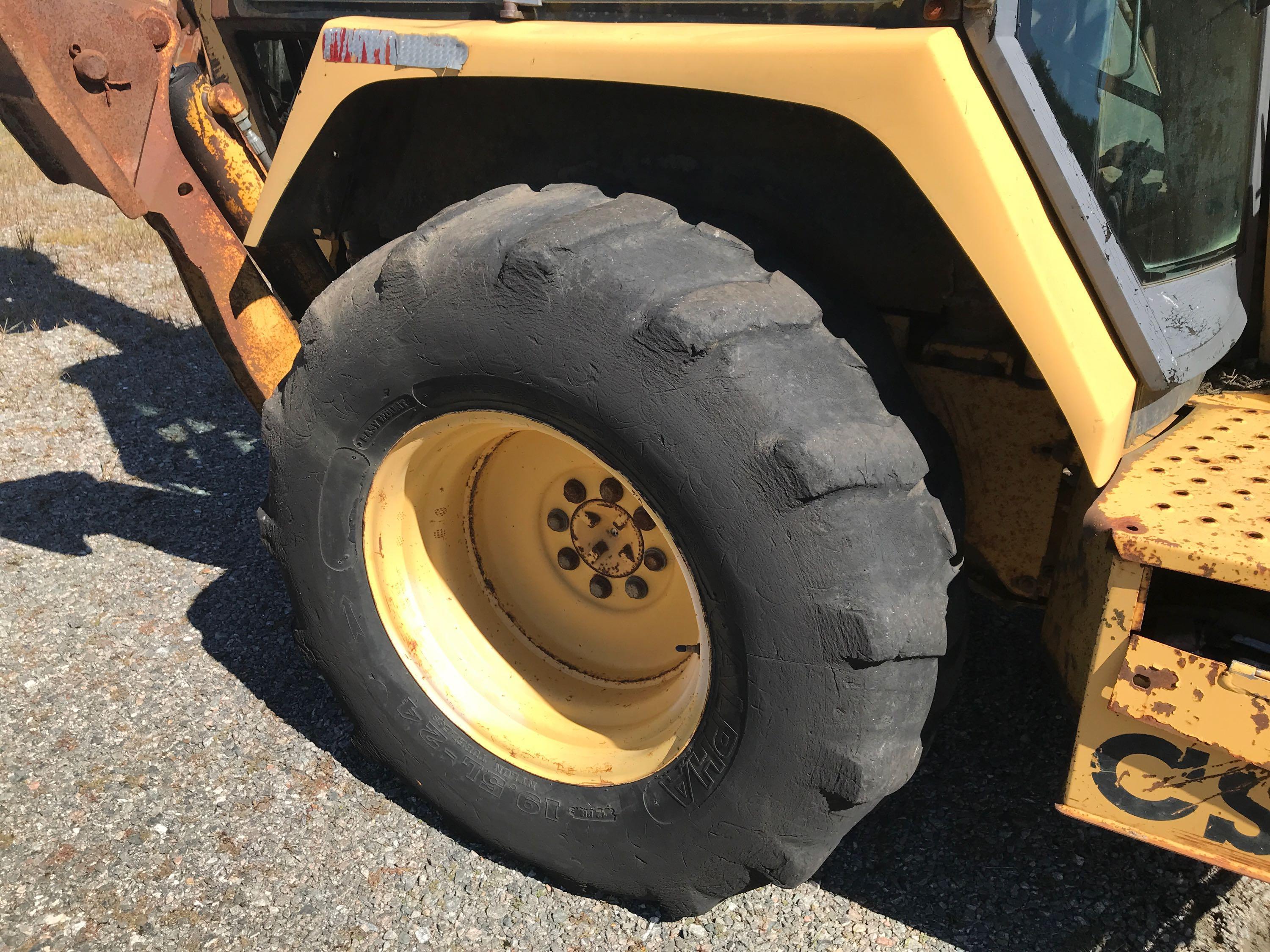 1995 John Deere 310D 4x4 Loader Backhoe (CSX Unit# TBH9523)