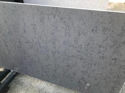 GRANITE & QUARTZ REMNANTS & SLAB RACK