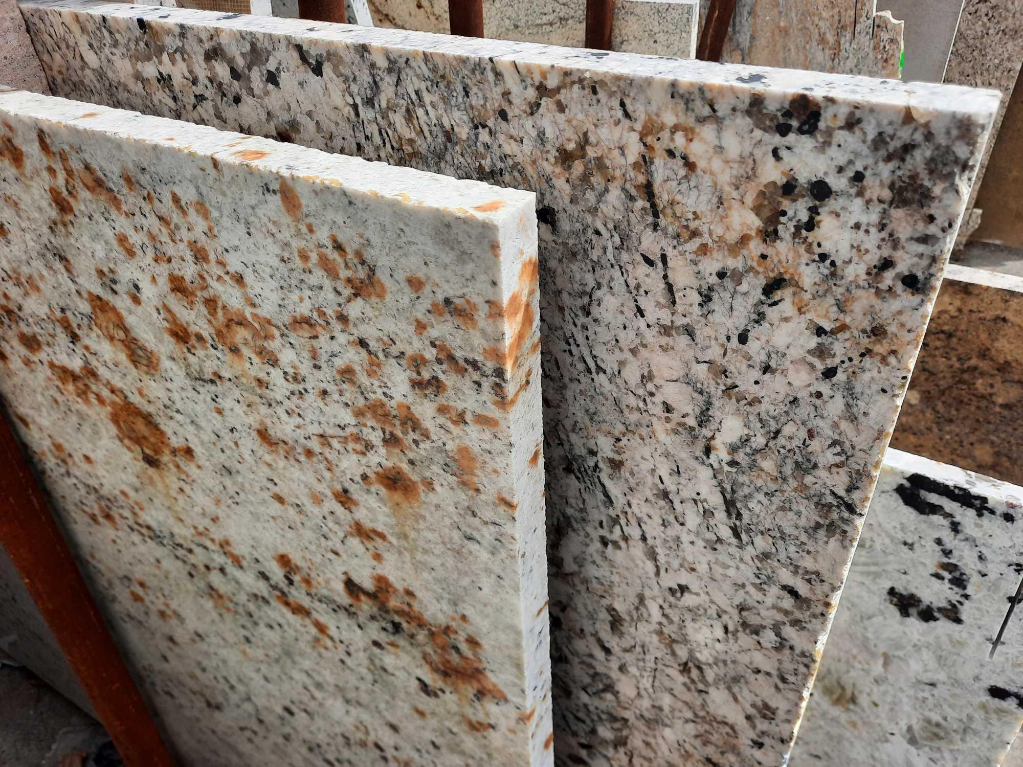 GRANITE & QUARTZ REMNANTS & SLAB RACK