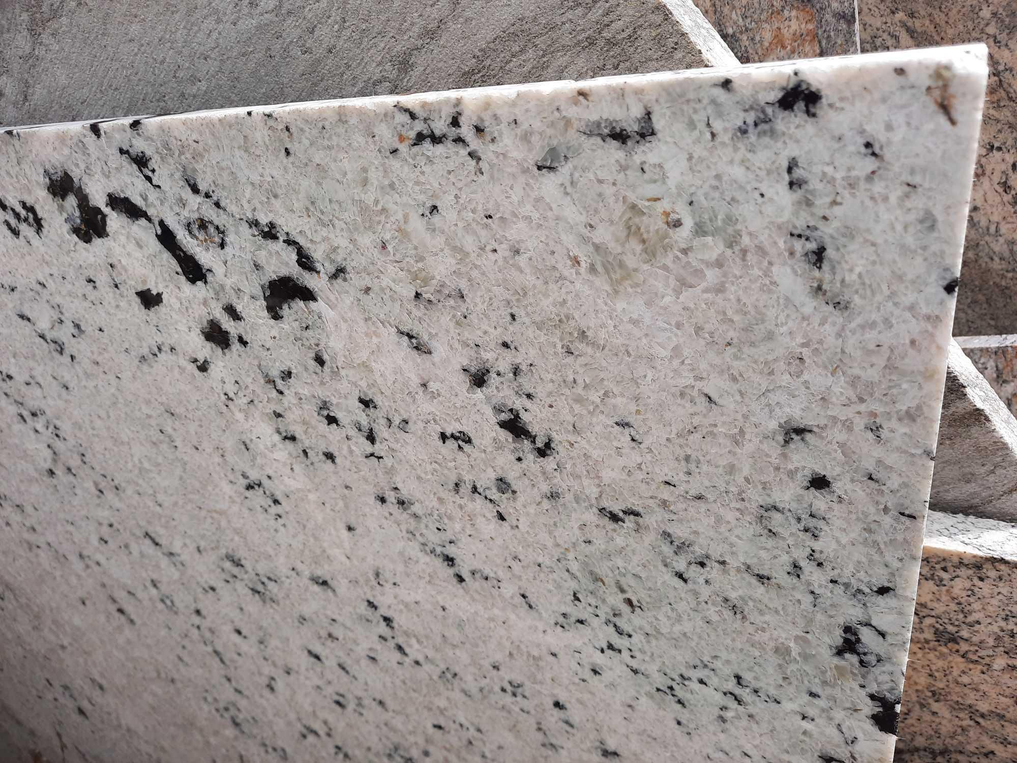 GRANITE & QUARTZ REMNANTS & SLAB RACK