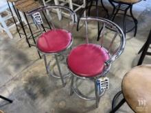 2 Swiveling Metal Stools