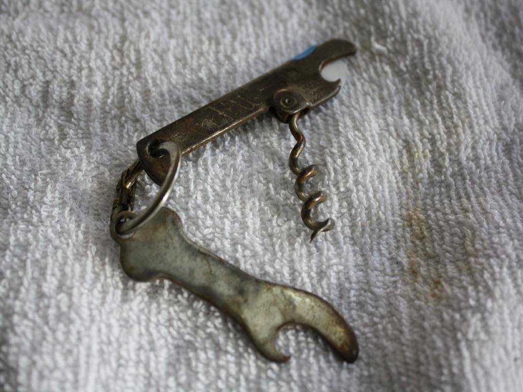 (2) Antique Advertising Bottle Openers