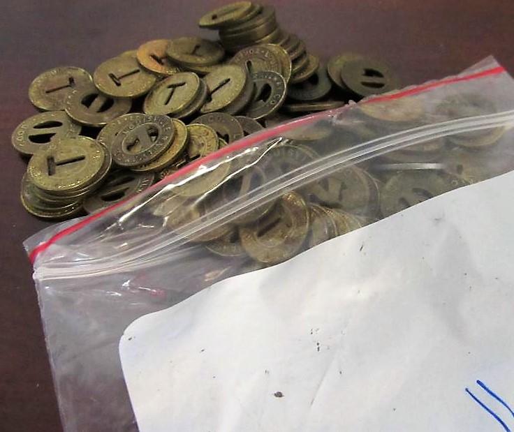 bag of Louisville transit tokens