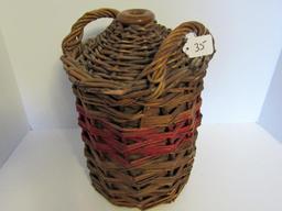 Crock jug in a wicker container