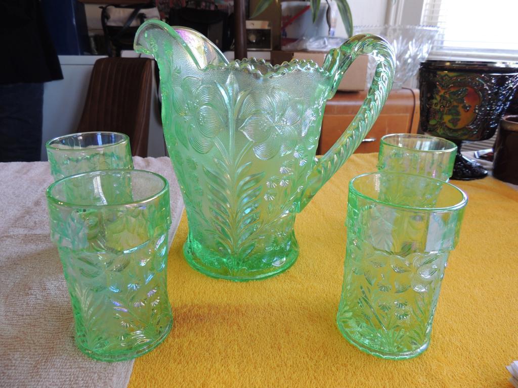 Mint green pitcher with four glasses
