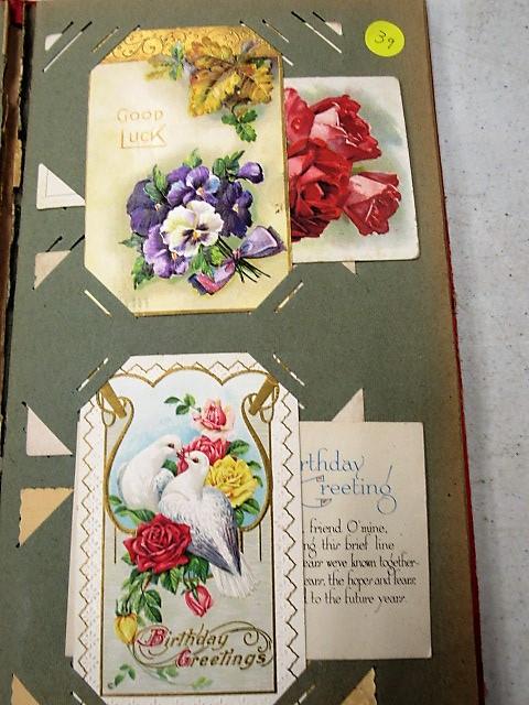 50 1910 era postcards in book