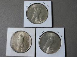 (2) 1922 and a 1922S Peace Dollars