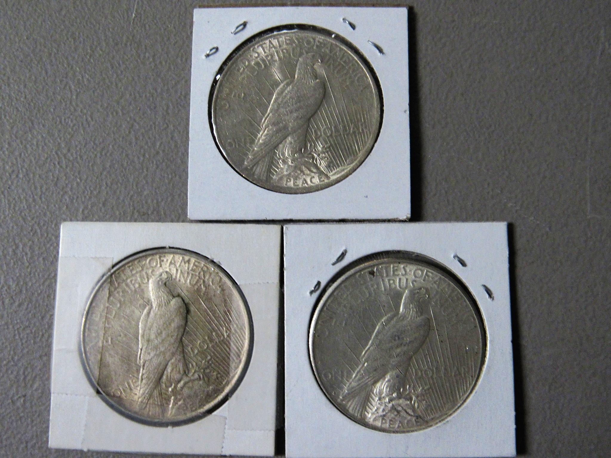 (2) 1922 and a 1922S Peace Dollars