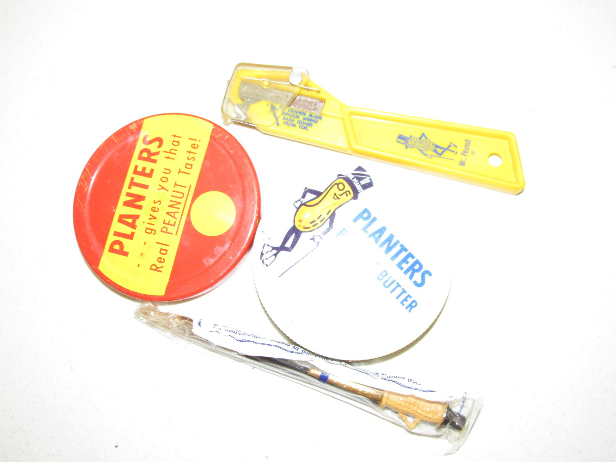 2 Planters Peanuts Lids, a pen, Envelope opener