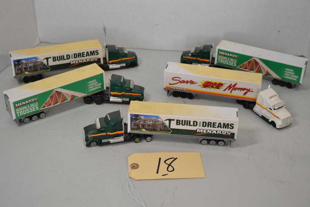 5 small Menard's toy semi trucks