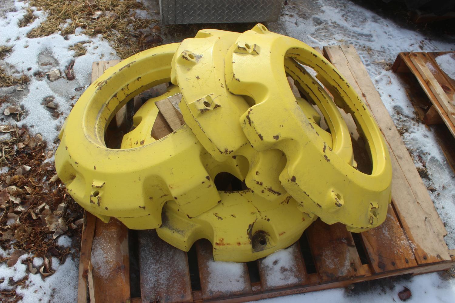 (4) John Deere Wheel Weights (2) 165-lb Starter Weights And One Pair Of 450-lb Wheel Weights.