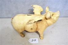 Cast iron flying pig bank