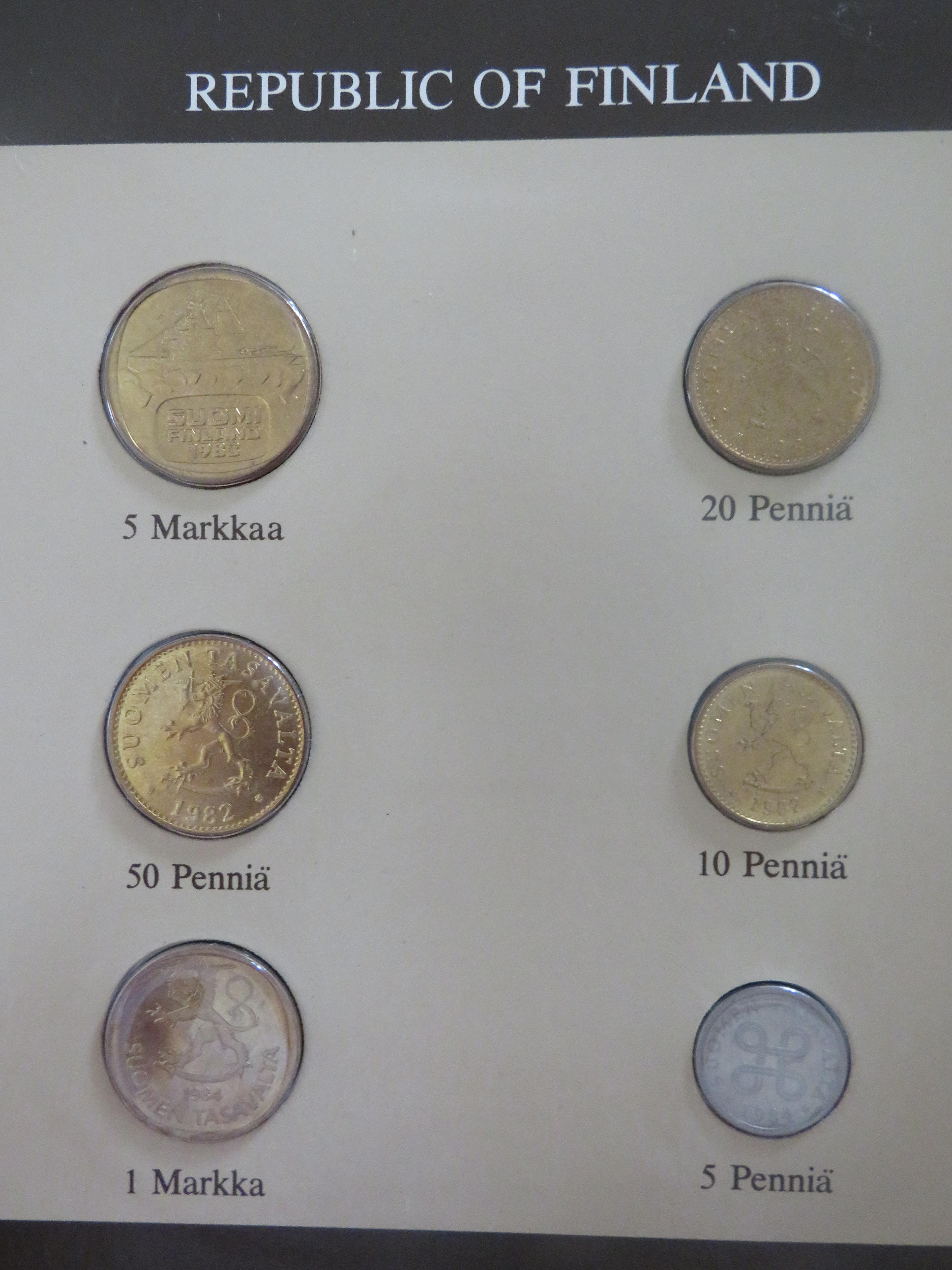 2 Pages Forgien Coin Sets