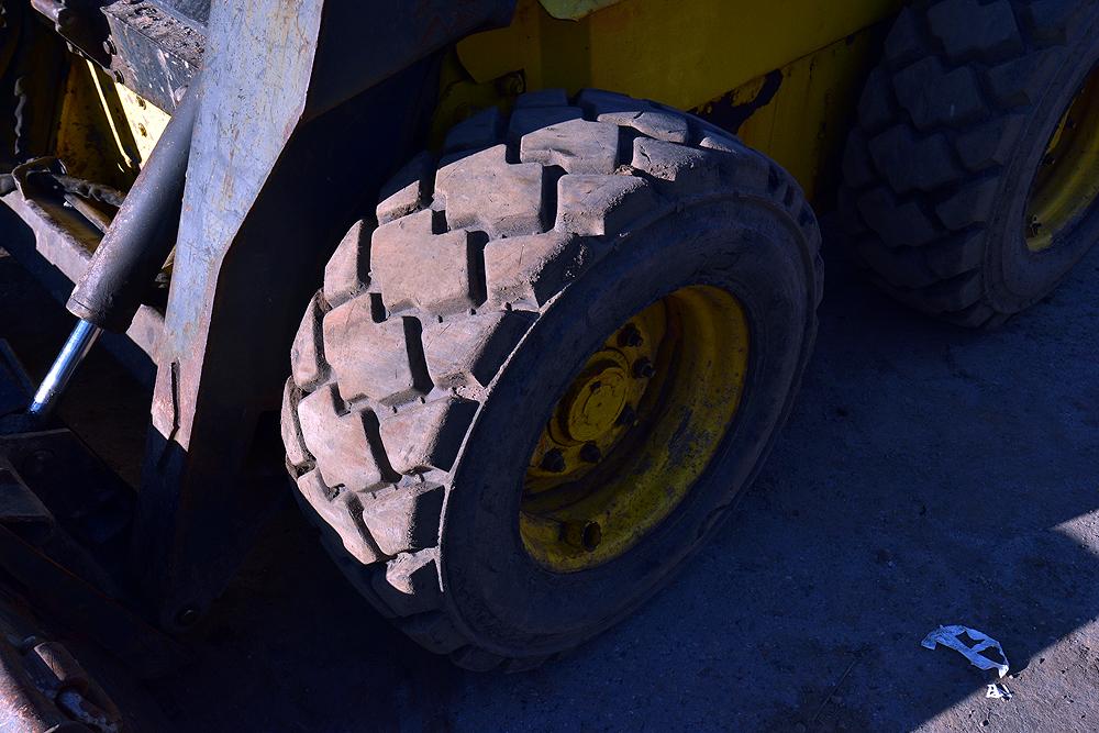 2002 New Holland C180 Skid Steer